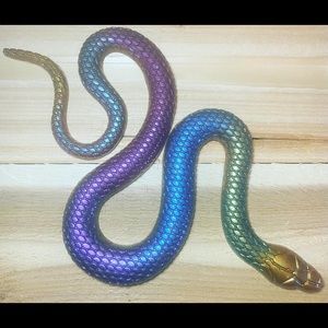 I am selling a beautiful snake. It has gorgeous colors, and is made out of resin